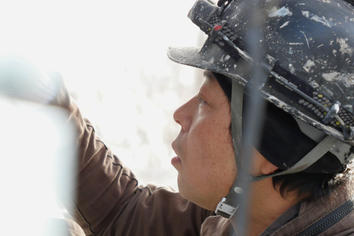 代表の作業中の表情